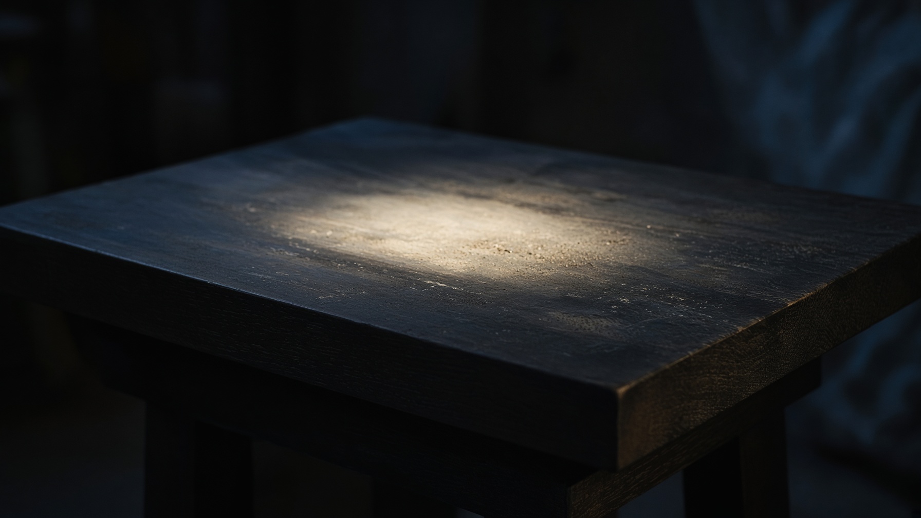 An empty table in a beam of light